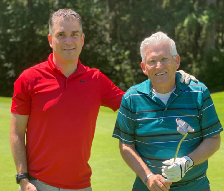 Thomas Larkin and Thomas Larkin II on a golf course