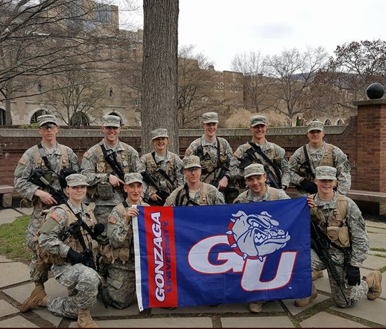 ROTC ranger challenge team holding GU flag 