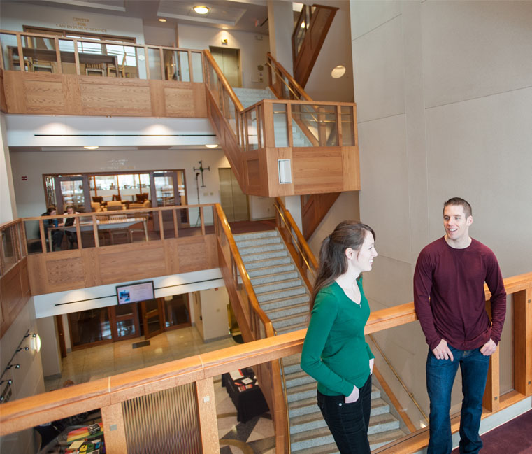 Law students talking by staircase