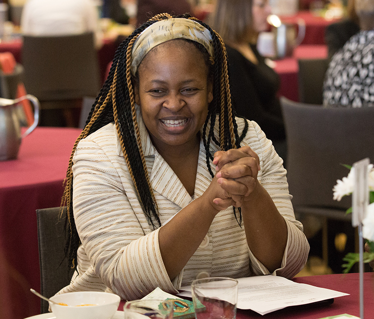 Rosemary Muriungi leads a table discussion during the Networking Lunch at Women Lead Spokane 2017