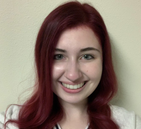 Female Staff Anne McCulloh is smiling