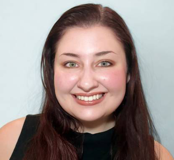 Up close photo of Anne smiling