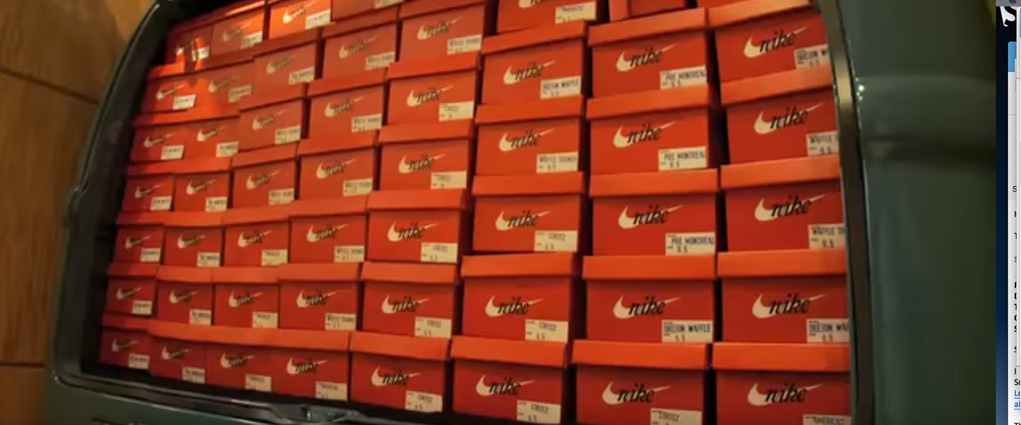 Nike shoe boxes stacked up in a van