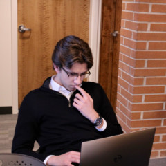 student using computer to study