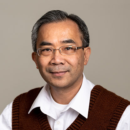 Portrait of Quan Tran, S.J. Lecturer of Religious Studies