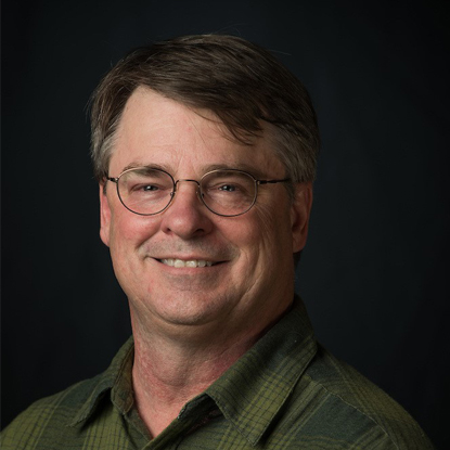 Portrait of John S. Spencer, Associate Professor of Library Public Services.