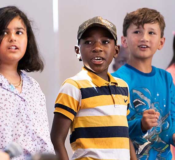 students listening to teacher (not pictured)