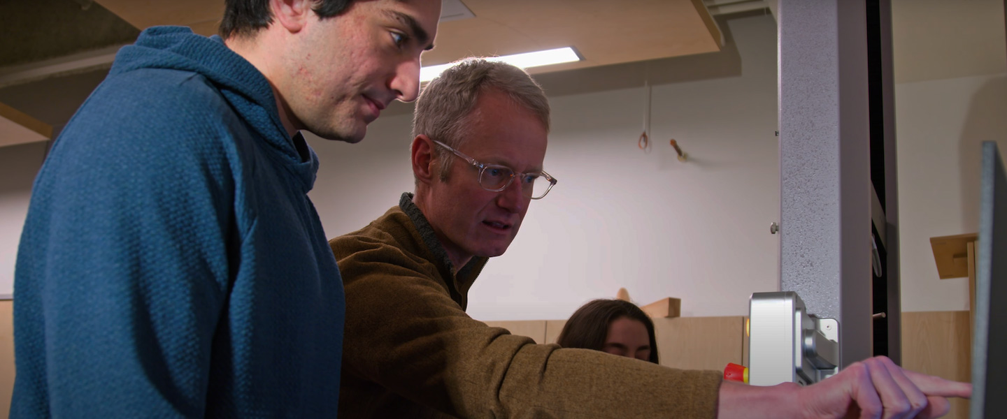 Professor helping a student 