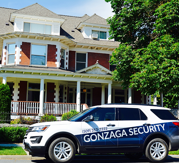 Security vehicle in front of Huetter Mansion