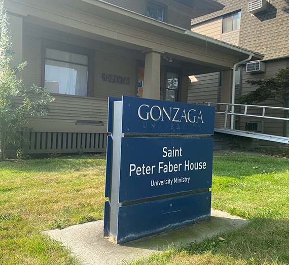 Exterior of house and marker for Saint Peter Faber House.