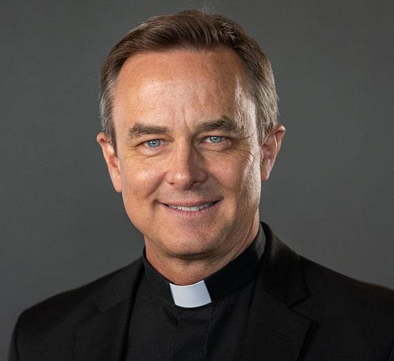Father Hendrickson is on the board of trustees for Gonzaga University. 