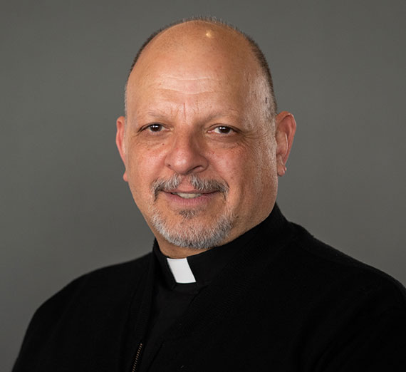 Father Lamanna is on the board of trustees for Gonzaga University. 