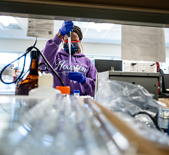 A student works in the Biochemistry Lab.
