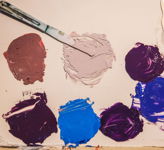Mixing paint on a palette