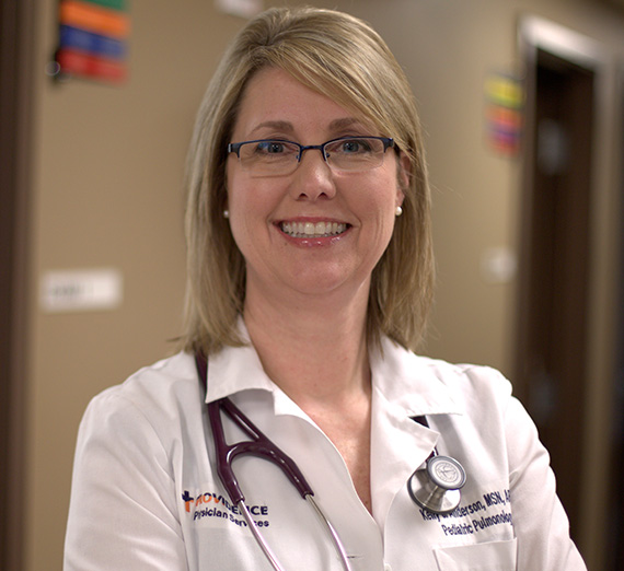 MSN family nurse practitioner graduate smiling 