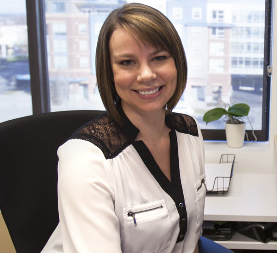 MSN Alumna at desk 