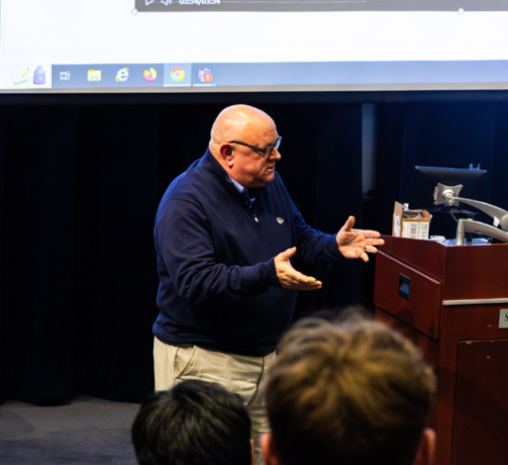 Gary Weber Speaking in Auditorium