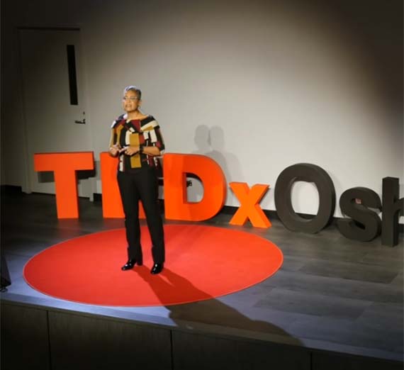 Nicole West-Burns, Ph.D. speaking at TEDxOshawaED