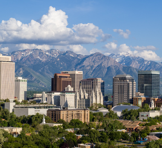 Denver cityscape with Rock mountains in the background.