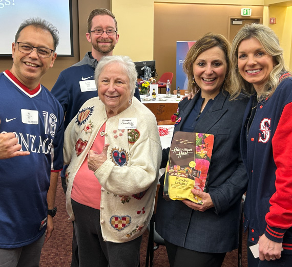 Gonzaga President Katia Passerini, Ph.D. and Forging Forward San Jose event attendees pose for a group photos