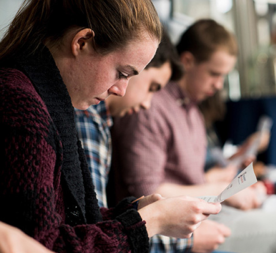 ������ students and recipients of the alumni scholarship reads their scholarship award letter