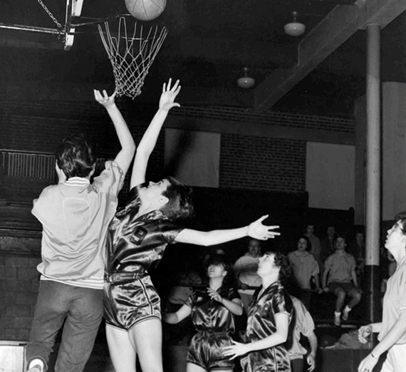 Members of the Gonzaga women's basketball team play in 1959.