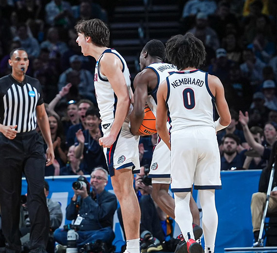Members of the Gonzaga men's basketball team celebrate.
