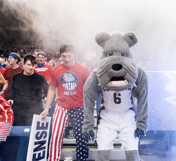 spike with cheering crowd at basketball game 