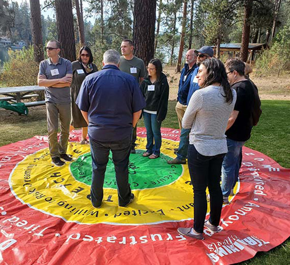 Participants in Gonzaga's Authentic Leadership Program gather for a leadership exercise.