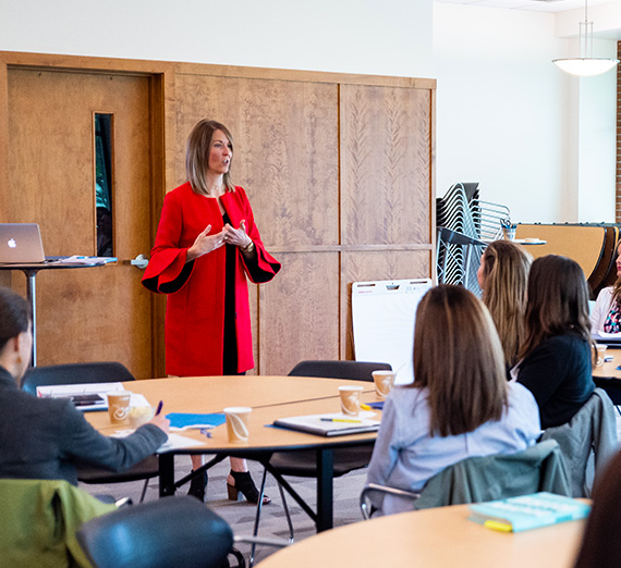 Professor answering students questions