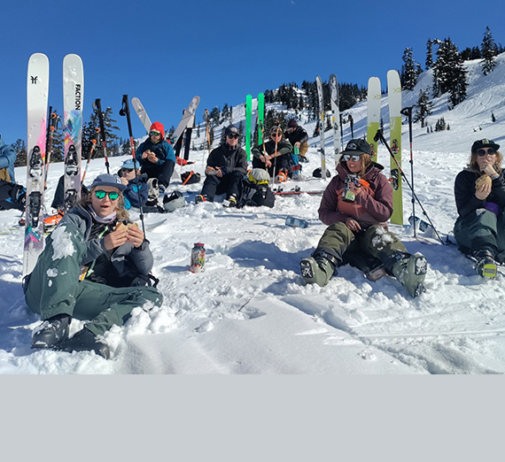 Students with GU Outdoors take a break during their avalanche training.