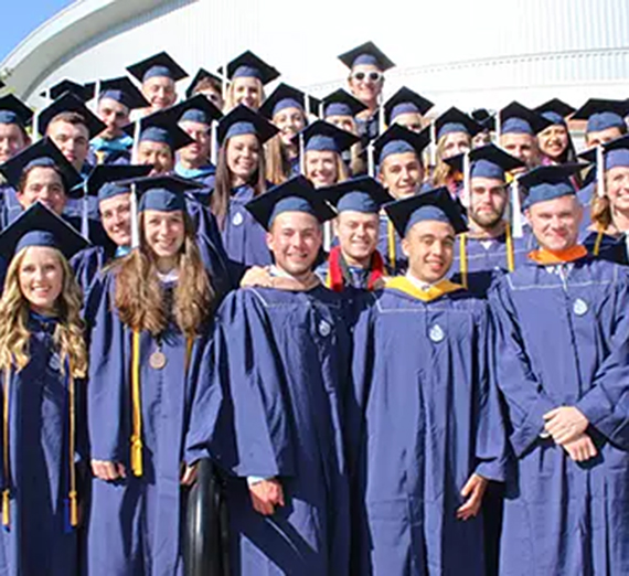 Group of student in robes at graduation.