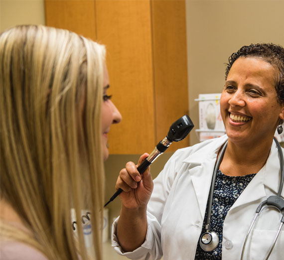 student getting checkup at health center