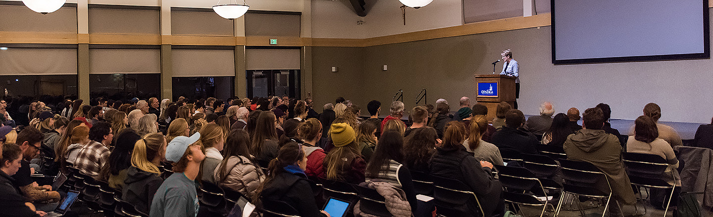 A humanities based presentation given by a speaker to a larger audience at Gonzaga University