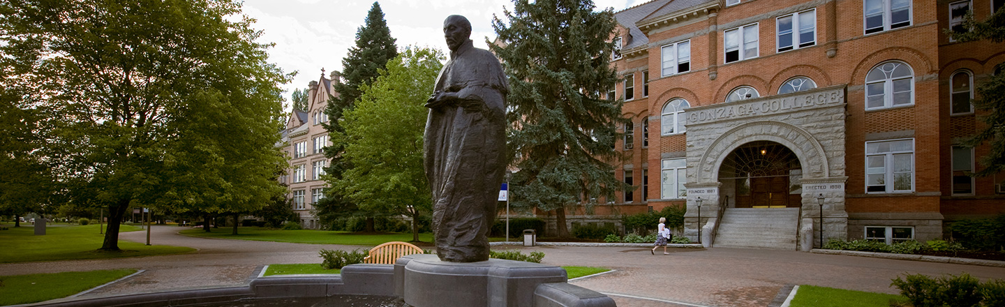 Gonzaga University College Hall with Statue in Foreground