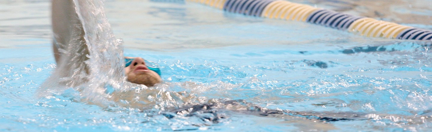 Swimmer competing in the pool