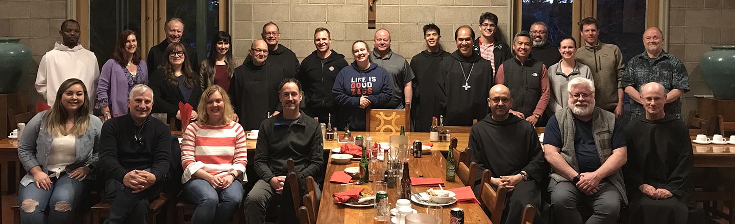 Students, professors and monks pose for photo at St. Andrew's Abbey