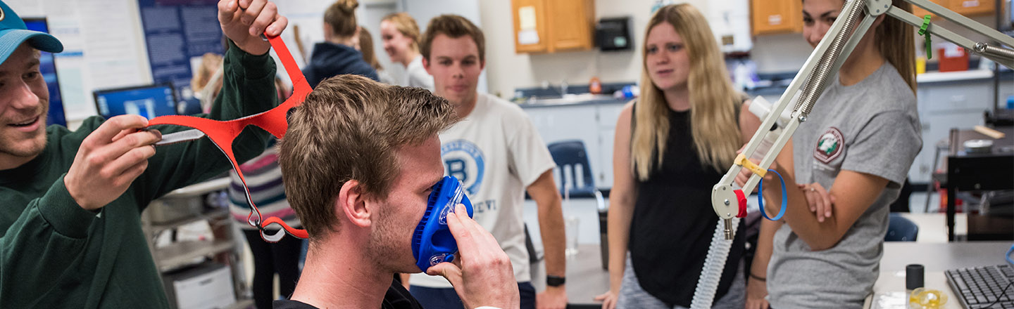 A Human Physiology student puts on a mask