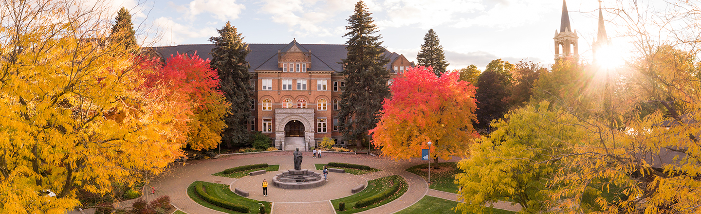 drone shot of College Hall on the Gonzaga University campus in the fall