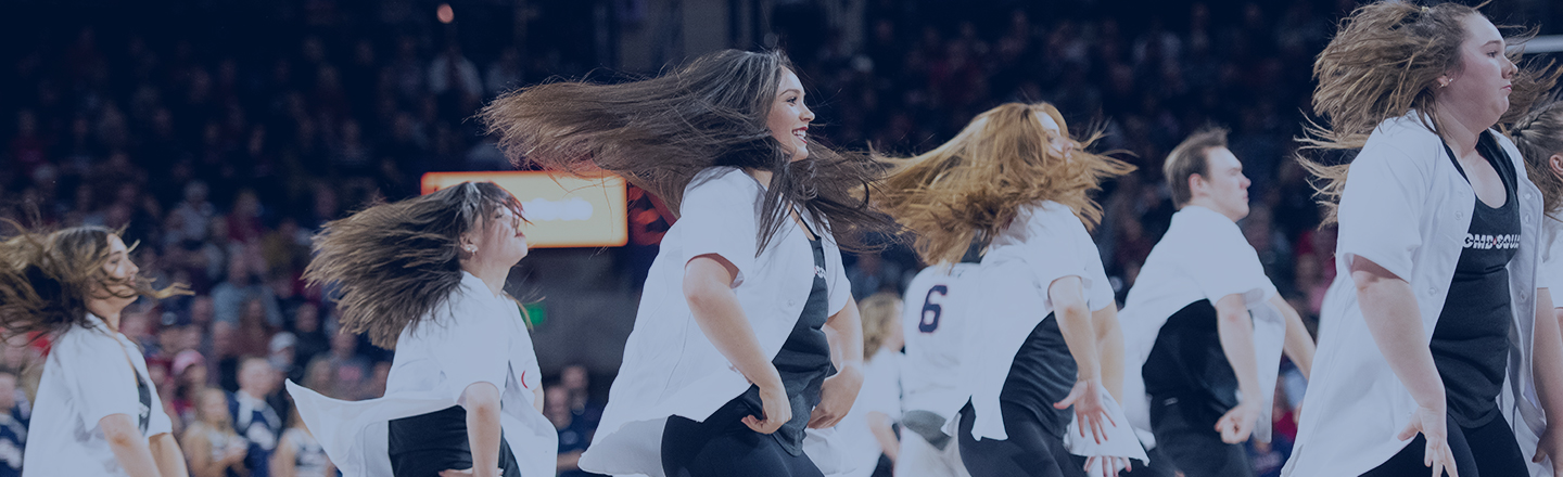 Gonzaga University dance team performs at a basketball game