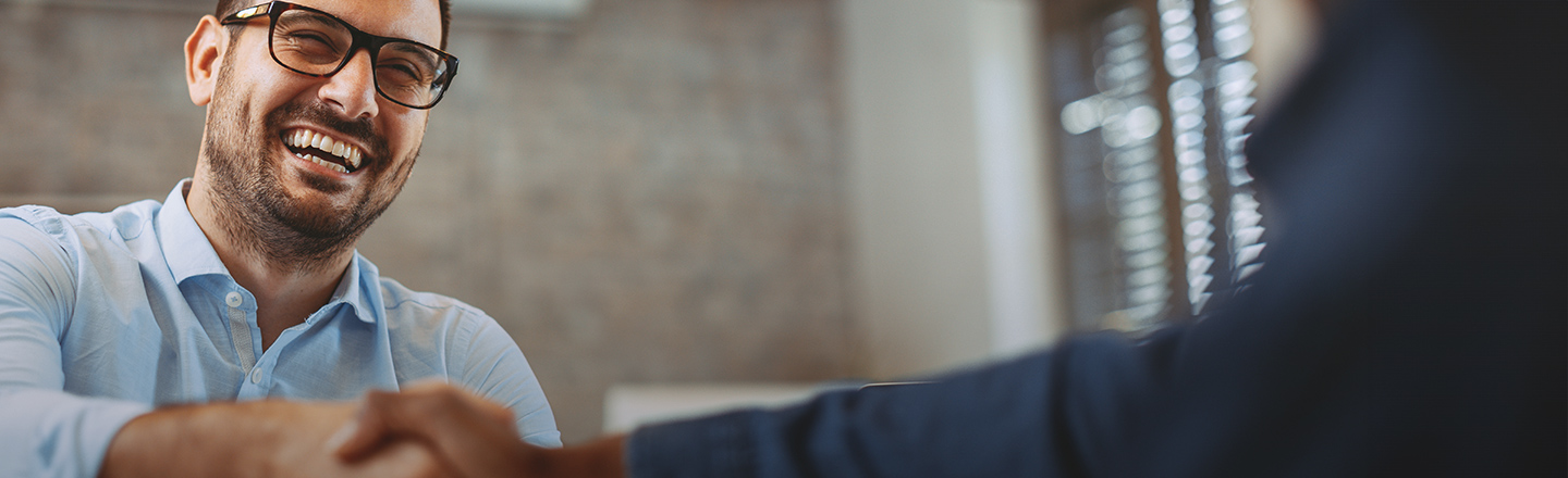Two people shaking hands