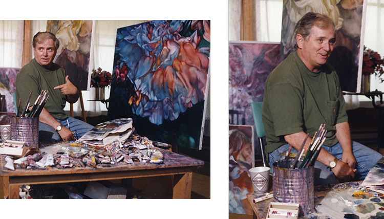 art teacher Robert Gilmore sits in his workspace surrounded by paint