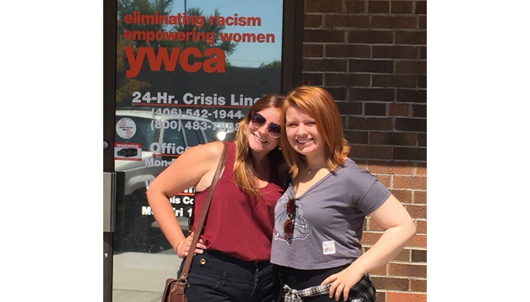 Cat and Liv outside the YWCA crisis center entrance in Missoula