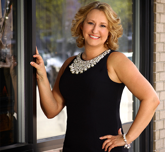 Alumni Sara Becker poses outside. 