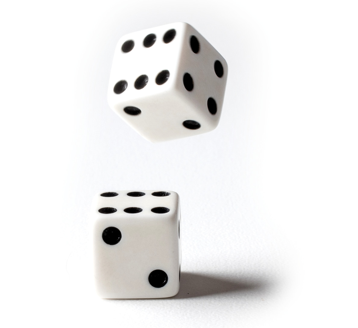 A pair of dice falling from above