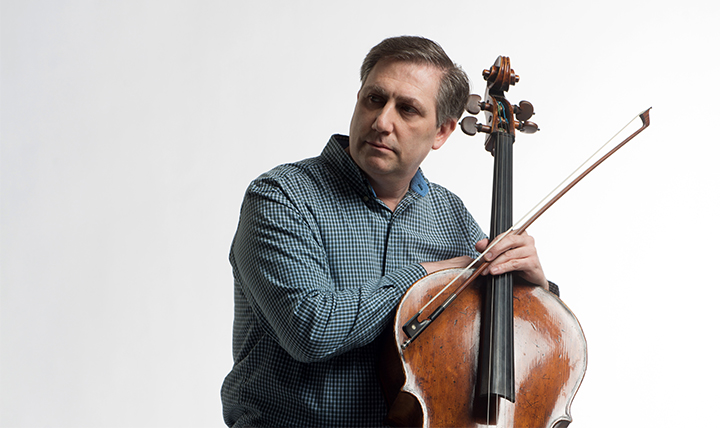 male musician with cello