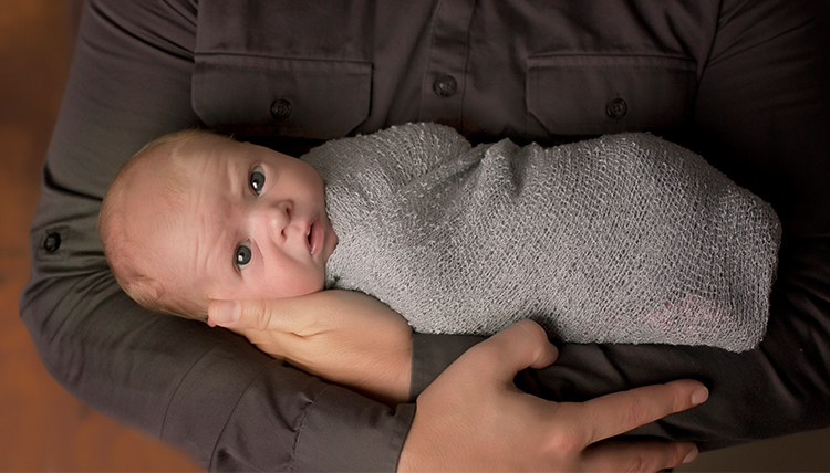 gonzaga alum baby zander williams wrapped in gray