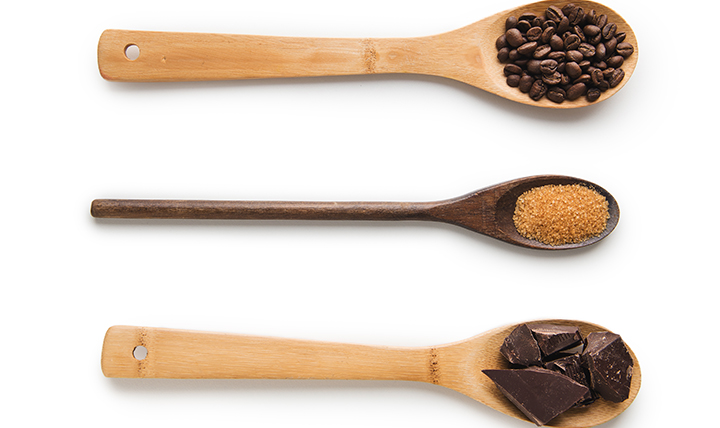 three spoons with coffe sugar and chocolate