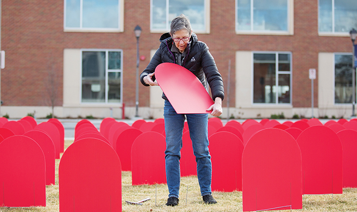 Gonzaga woman with tombstones for suicide awareness