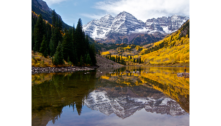 Colorado mountains with lake and fall foliage in the foreground